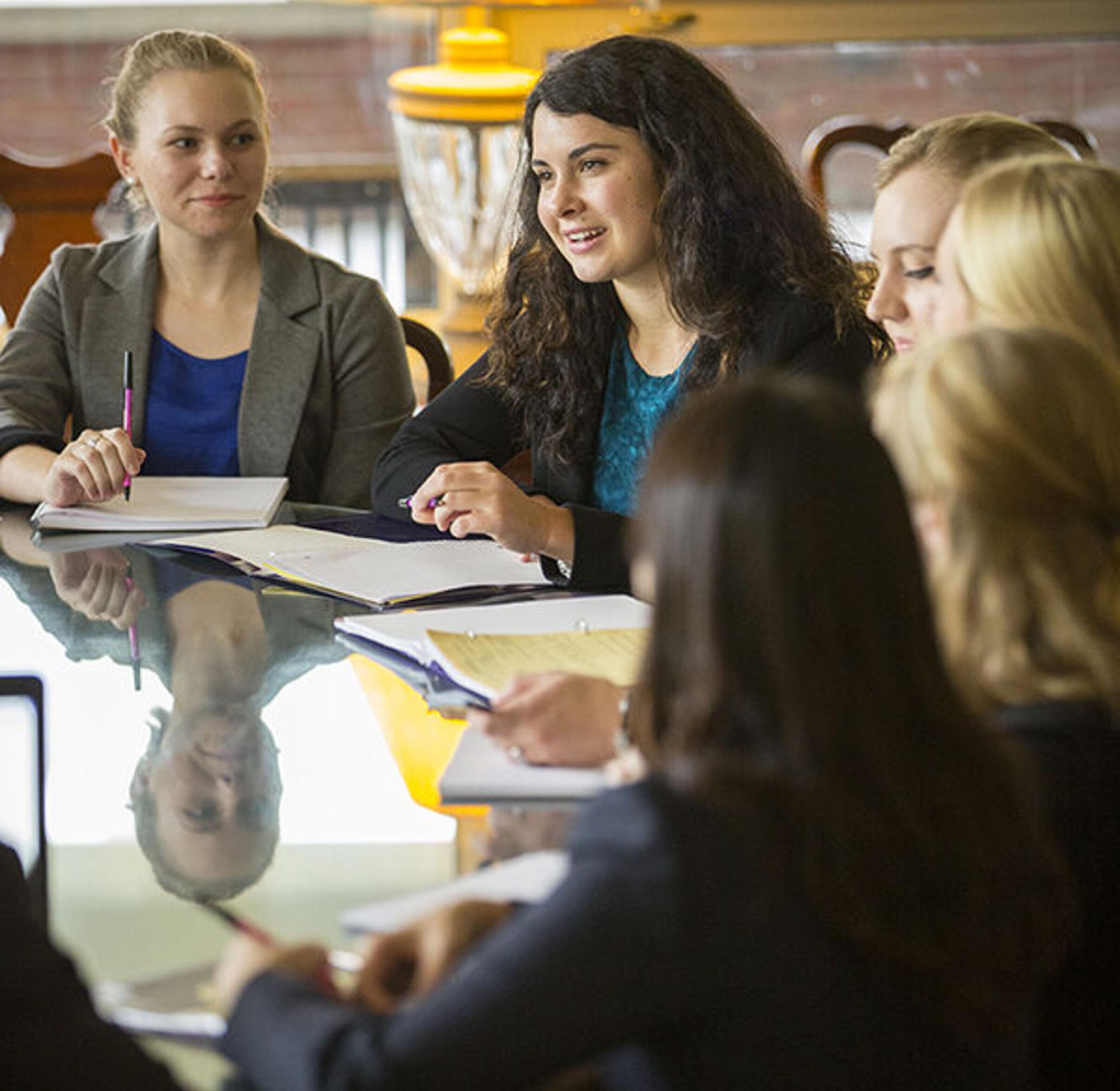 Business students take part in a round table discussion